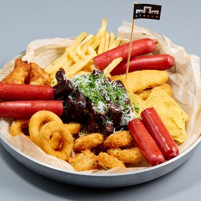 Большая фирменная закуска в Stella Lounge по цене 65 р.