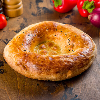 Тандырная лепешка на сливочном масле в Fasol & Food по цене 99 ₽