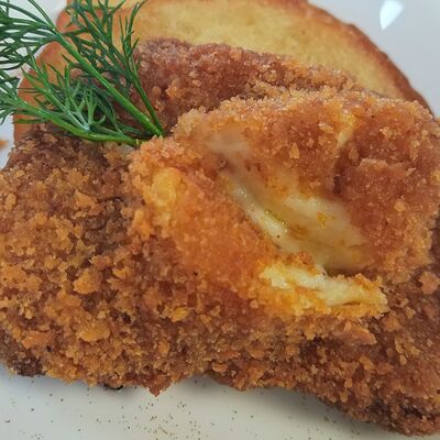 Шницель нежность с сыром в Вкусно как дома по цене 399 ₽