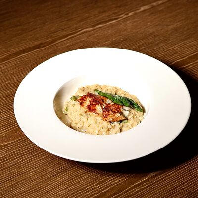 Ризотто с угрем и спаржейв Пьяцца по цене 990 ₽