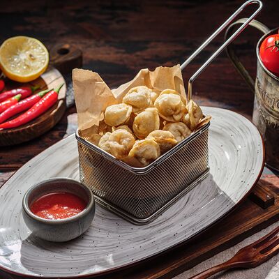 Жареные пельмени в Пельмения по цене 495 ₽