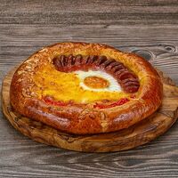 Пирожок с сосиской и яйцом в Зам-Зам