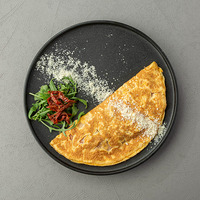 Омлет с кольцами кальмаров и креветками, томлеными на сливках в Диккенс