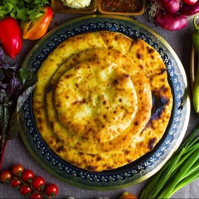 Осетинский пирог со свининой в Шаломня по цене 600 ₽