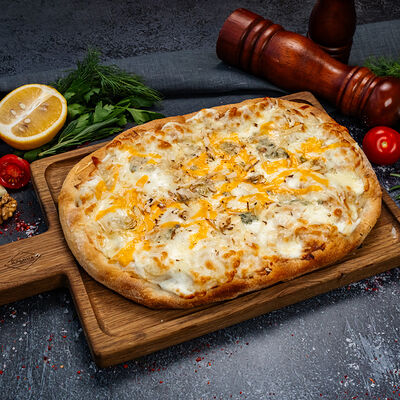 Пицца Римская Четыре сыра в КРЫША по цене 1030 ₽