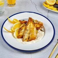 Сибас на овощной подушке в Замок Двин