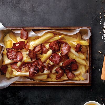 Картофель под сырной лавой с беконом в Meal me по цене 300 ₽