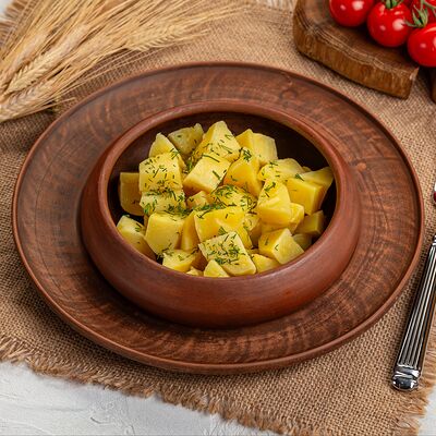 Картофель отварной с маслом и зеленью в Русская кухня по цене 280 ₽