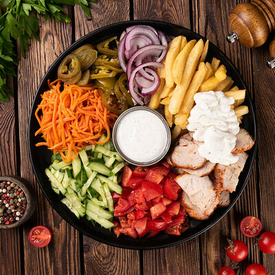 Шаверма на тарелке Цезарь в Кухня 91 по цене 588 ₽