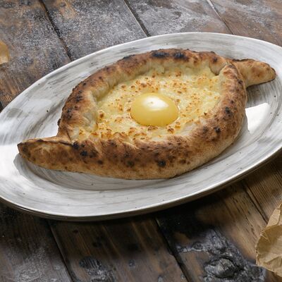 Хачапури по-аджарски в Ресторан Мангал по цене 490 ₽