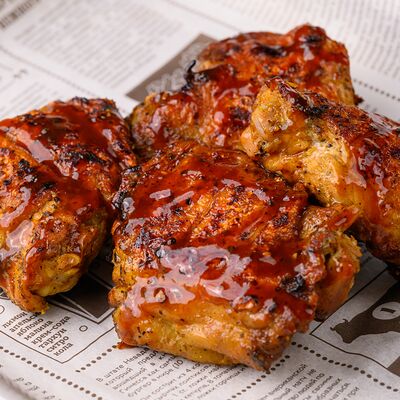 Куриные бёдрышки в American BBQ по цене 94 р.
