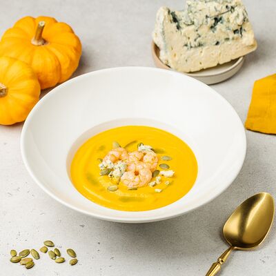 Тыквенный крем-суп с горгонзолой и тигровыми креветками в АндерСон по цене 810 ₽