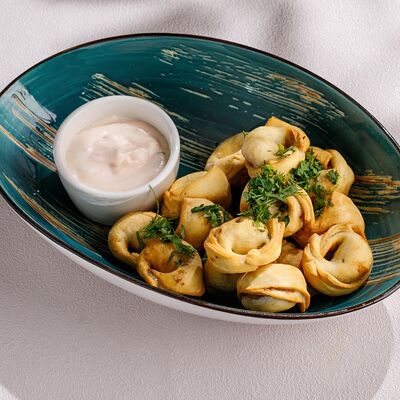 Чучвара с бараниной и восточным соусом в Чайхана Пахвала по цене 550 ₽