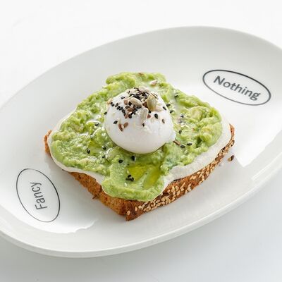 Авокадо тост c яйцом пашот на безглютеновом хлебе в Nothing Fancy по цене 750 ₽
