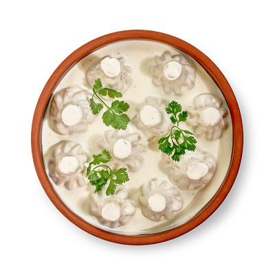 Мини-хинкали с курицей в сырном соусе в Старик хинкалыч по цене 525 ₽