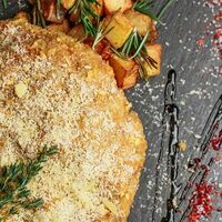 Шницель из говядины с картофелем в Лимончини