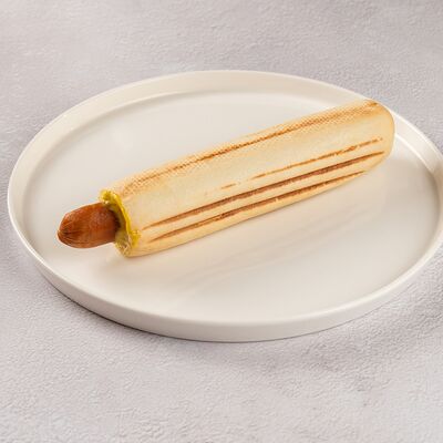 Французский хот-дог с куриной колбаской в Сабирос по цене 410 ₽