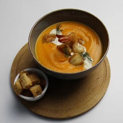 Крем-суп из тыквы с креветкой в Асгард по цене 638 ₽