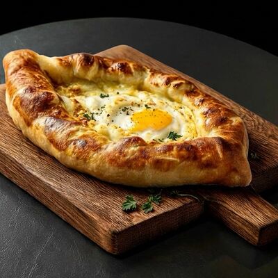 Хачапури по-аджарски в Винегрет по цене 530 ₽