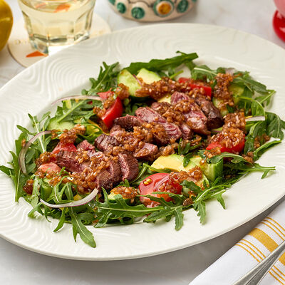 Стейк-салат с мраморным мачете, томатами, авокадо и руколойв Osteria Dolce по цене 1100 ₽