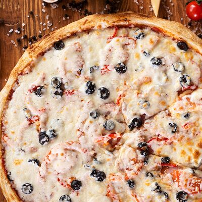 Пицца с семгой в Адельфия по цене 1150 ₽