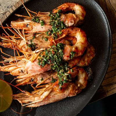 Лангустины на гриле с соусом чимичурри в Wine and Whiskey by Simple по цене 1100 ₽