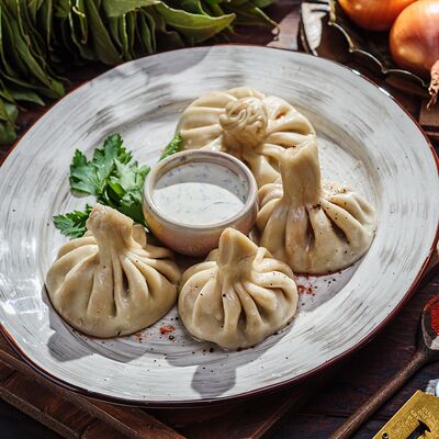 Хинкали с говядиной и свининой в Пельмения по цене 672 ₽