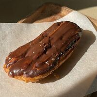 Шоколадный эклер в Sant