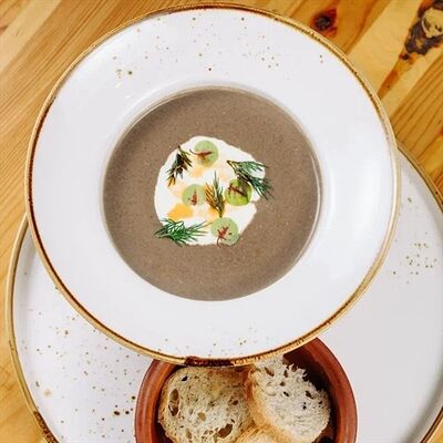 Грибной крем-суп с пармезановым муссом в Наше место по цене 650 ₽