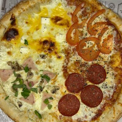 Пицца 4 сезона в Ymi по цене 770 ₽