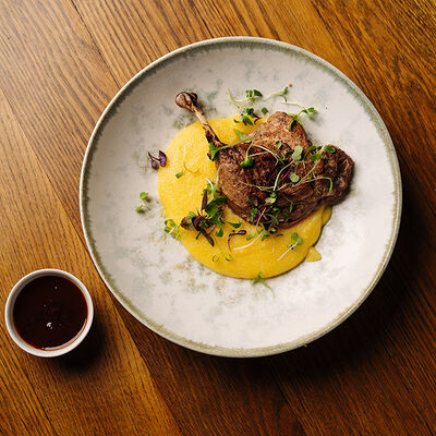 Утка конфи с полентой в Dolce Far Niente по цене 1100 ₽