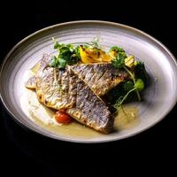 Филе сибаса на гриле с брокколи и артишоками в Бар & ресторан Луч