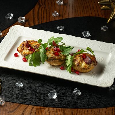 Запеченные шампиньоны с сырным кремом в Giorgio Suluguni по цене 760 ₽