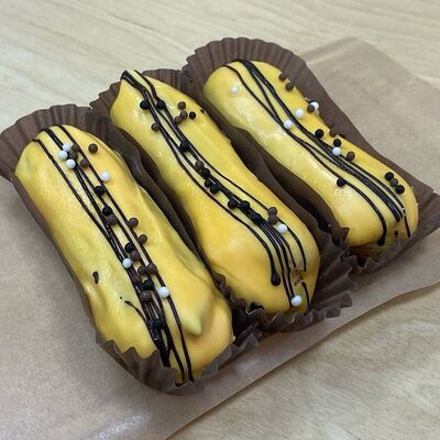 Эклер манго-маракуйяв Do.bro coffee по цене 240 ₽