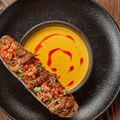 Тыквенный суп с копченостями в Британника Север по цене 595 ₽