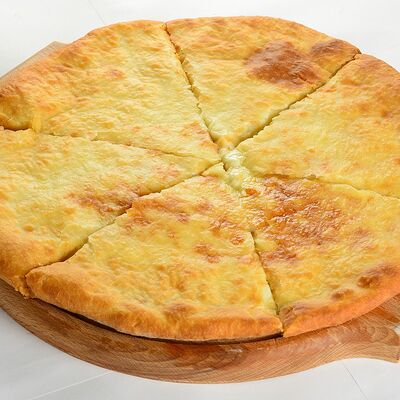 Осетинский пирог с картошкой и сыром в Шаурма на мангале 24 по цене 500 ₽