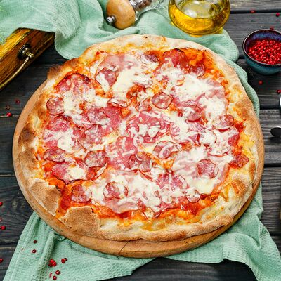 Пицца Мясная М в Pizza 33 см по цене 610 ₽