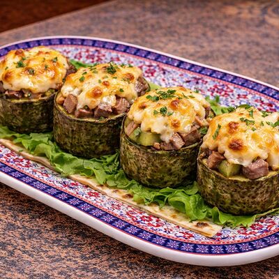 Рулетики из цукини с языком, грибами, сыром в Тминъ по цене 570 ₽
