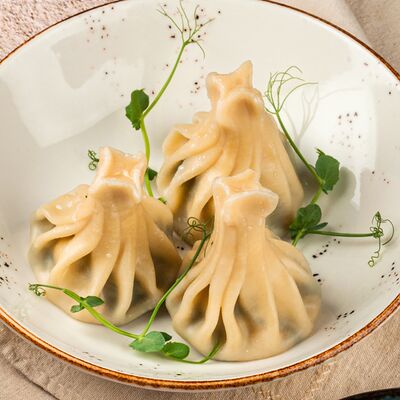 Хинкали с телятиной в Омар Хайям Европа и Азия по цене 400 ₽