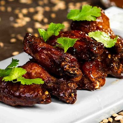 Куриные крылышки в Paulaner Wirtshaus Polyanka по цене 720 ₽