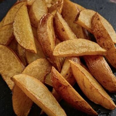 Картофель по-деревенски в Вкусный домик по цене 200 ₽