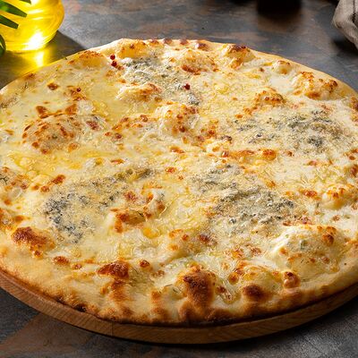 Пицца 4 сыра в Форель по цене 950 ₽