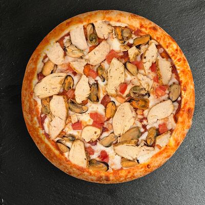 Пицца Том ям в AnjI PizzA по цене 589 ₽