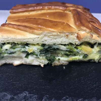 Пирог с зелёным луком и яйцом в Кофе в кубе по цене 250 ₽