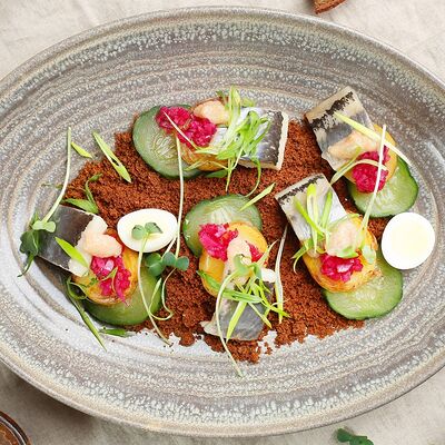 Филе сельди с молодым картофелем в Four по цене 580 ₽