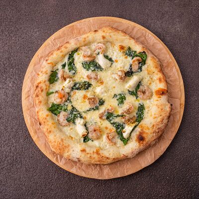 Пицца Креветки-шпинат в Cosmo пицца пучча по цене 1015 ₽