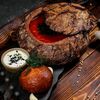 Борщ в хлебе в The River Restaurant по цене 700