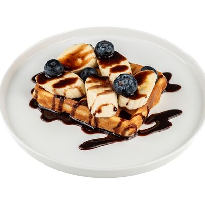 Вафли с бананом и шоколадным топпингом в Ромбаба по цене 445 ₽