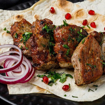 Шашлык из свиной шеи в Мангал холл по цене 1150 ₽