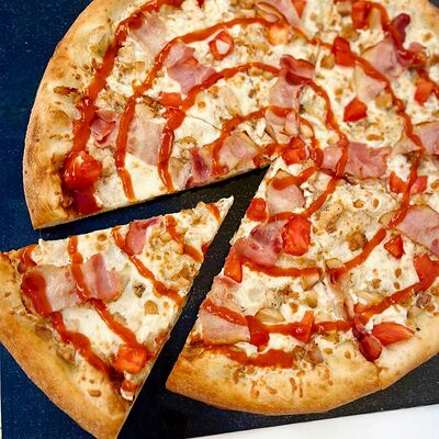 Пицца Торино 25см в Панда Бистро по цене 621 ₽